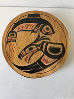 Top view showing full Haida artwork on lid and signature