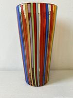 Front view of striped Murano glass vase
