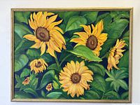 Full view of framed sunflower oil painting