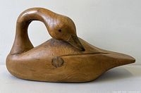 Left side view of carved wood duck decoy