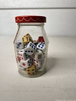 Jar showing assorted dice