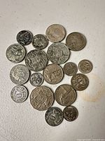 All 18 Australian coins spread on surface