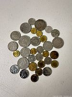 Top-down view showing the full assortment of 38 Philippine coins