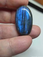 Front view of oval labradorite showing blue flash