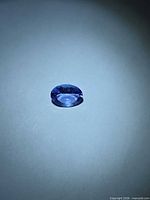 Oval faceted blue-violet tanzanite front view