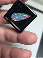 Front view of opal showing multicolour pinfire pattern