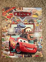 Front cover of Disney Cars Look & Find hardcover book showing characters and title