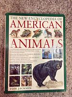 Front cover showing full title, wildlife images, author name