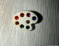 Front view showing palette shape and coloured rhinestones