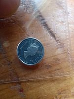 Obverse showing Queen Elizabeth II portrait in plastic flip