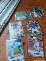 All six cards laid out on table