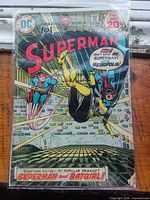 Front cover in bag showing title, issue number 268, 20¢ price, Batgirl appearance