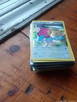Stack of Pokémon cards with reverse-holo Porygon-Z on top