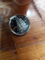 Reverse of 1997 Canadian proof dime showing Bluenose schooner and denomination 10 cents