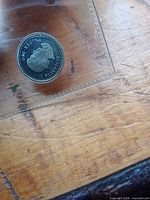 Obverse of 2006 Canadian silver dime in plastic sleeve