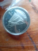 Reverse side of 1998 silver dime showing Bluenose schooner