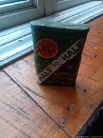 Front view showing Lucky Strike medallion and Half and Half banner