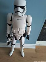 Front view of 32-inch First Order Stormtrooper holding blaster