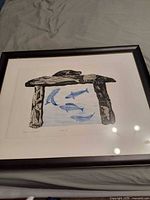 Full view of framed print under glass