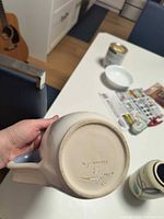 Underside showing impressed signature and date