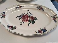 Top view of platter showing floral pattern and condition