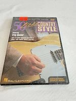 Front cover of sealed Hal Leonard 50 Licks Country Style instructional DVD