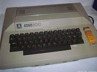 Front and top view of Atari 800 computer showing keyboard and logo