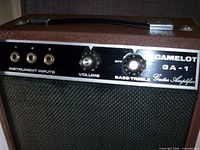 Front control panel showing Camelot GA-1 branding, inputs, knobs