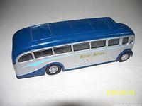 Left side view showing livery, windows, roof detail