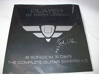 Front of sealed Player by Keith Urban course showing title, logo and shrink wrap