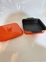 Dish and lid separated showing interior and exterior