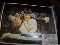 Close-up of card showing Harrison Ford retrieving idol, Spanish title block visible