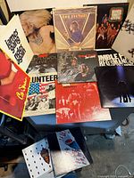 Group image of all vinyl LP fronts spread out on surface