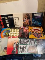 All ten vinyl album covers fanned out for identification