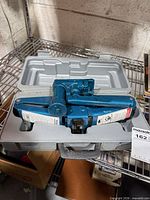 Scissor jack inside closed carry case