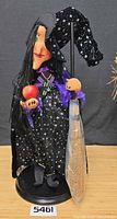 Full view of 23" Annalee witch doll on stand