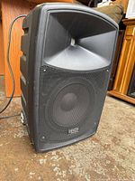 Front view of Denon Envoi speaker showing grille and horn