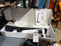 Lamp, adapter, manual and open box overview