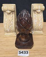 front view finial with both corbels behind