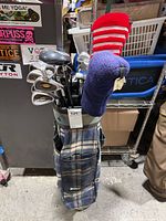Full view of bag with clubs and headcovers