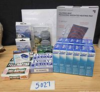 Group view of heating pad, bandages, soaps, oximeter and Hydro item
