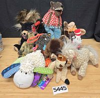 Group shot of entire plush lot on table