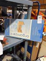 Boxed Organize-It storage organizer on shelf