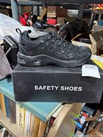 complete view of shoes on box showing design and color