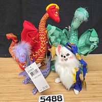 Group of four Annalee figures: red, green, purple dragons and wizard mouse