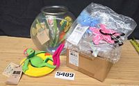 Overall lot showing fish bowl scene, frog on lily pad, bagged starfish & crab