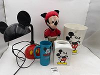 Group shot showing lamp, plush doll, mug, tissue cover, wastebasket