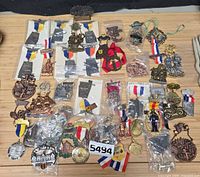 Group shot of all medals laid out on table