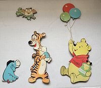 Front view of all five cardboard figures