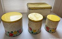 Bread box with three canisters showing overall design and condition